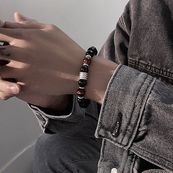 Armband Schwarzer Obsidian Tigerauge – Stärke elegantes Perlenarmband Handgelenk getragen