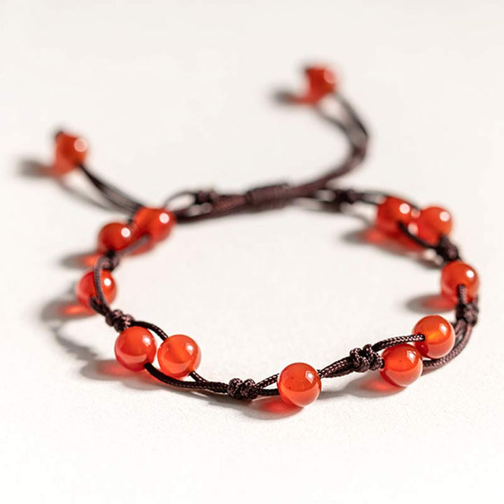 Armband Roter Achat Zinnober elastisch braune Schnur Naturstein glänzend