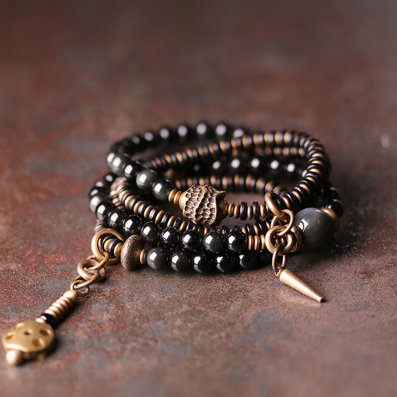 Armband Obsidian Kupfer mehrreihig schwarze Perlen Naturstein elegant.