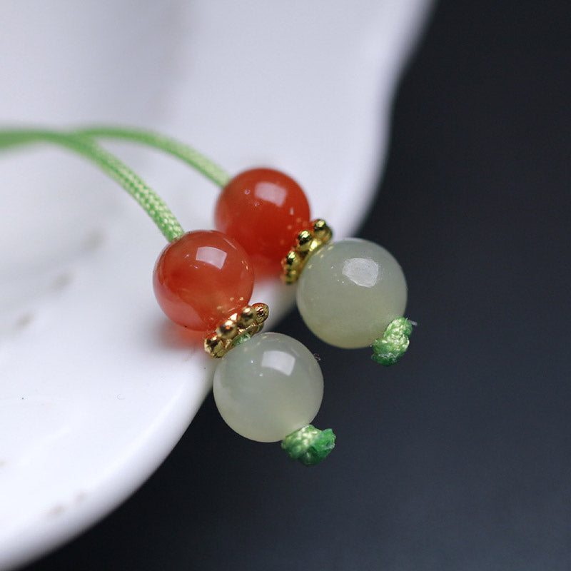 Grünes Jade Armband mit roten Perlen eleganter Schmuck Naturstein.