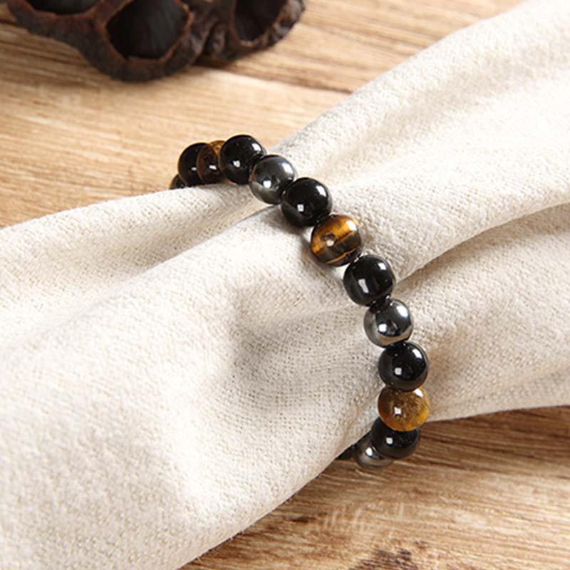 Armband Tigerauge Obsidian Perlen Naturstein Mut Kraft Schmuck