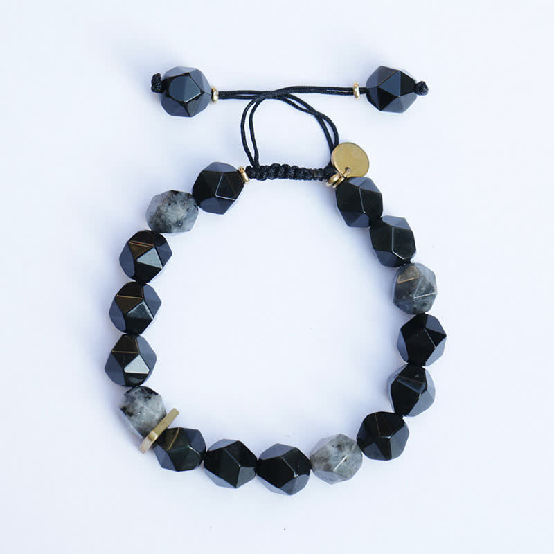 Schwarzes Obsidian Armband mit Natursteinen und Goldelementen elegant.