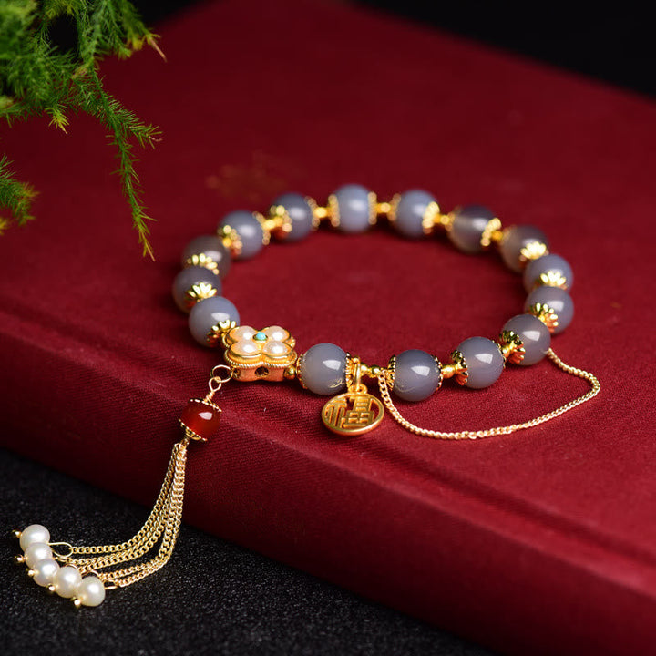 Grau Achat Perlen Armband mit goldenem Fu-Zeichen Charm elegant