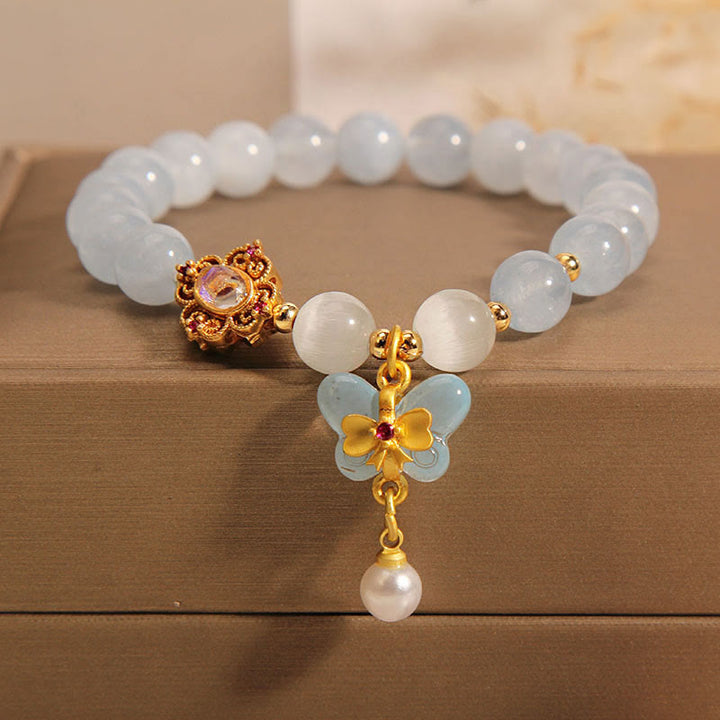 Armband Aquamarin Perle Schmetterling Heilung Energie elegant weiß gold