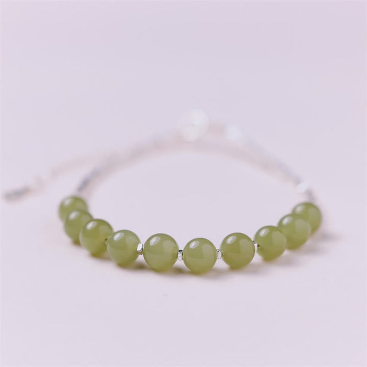 Jade Armband 925 Silber grüne Perlen elastisch Glück Naturstein