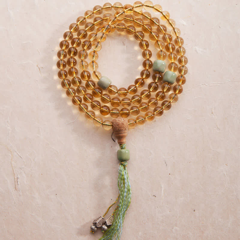 Mala Armband mit Sandelholz, Jade Perlen und grüner Quaste.