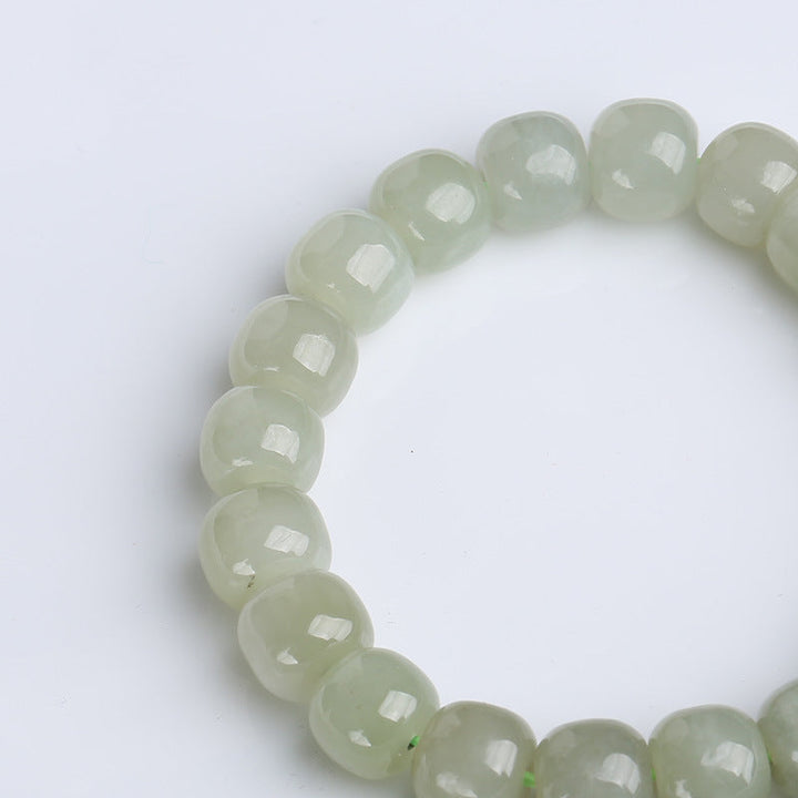 Jade Armband Glück Segen hellgrün facettiert Perlen Nahaufnahme Flat Lay