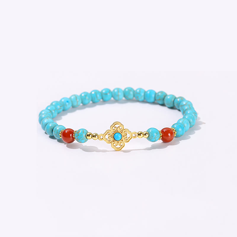Armband Türkis – Schutz & Balance mit goldenen Perlen und roten Steinen