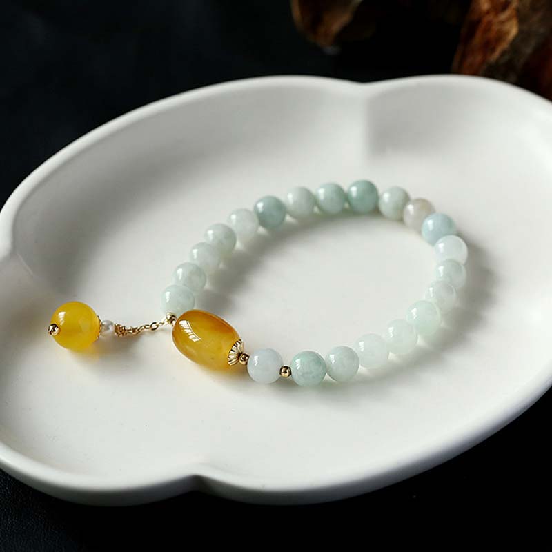 Armband weiße Jade Achat mit goldenen Perlen Schutz elegant