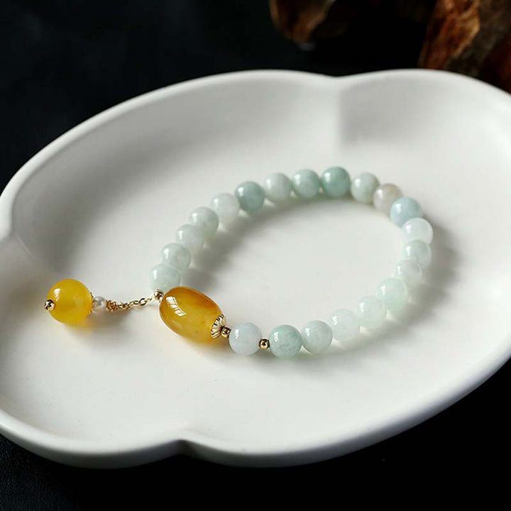 Armband weiße Jade Achat mit goldenen Perlen Schutz elegant