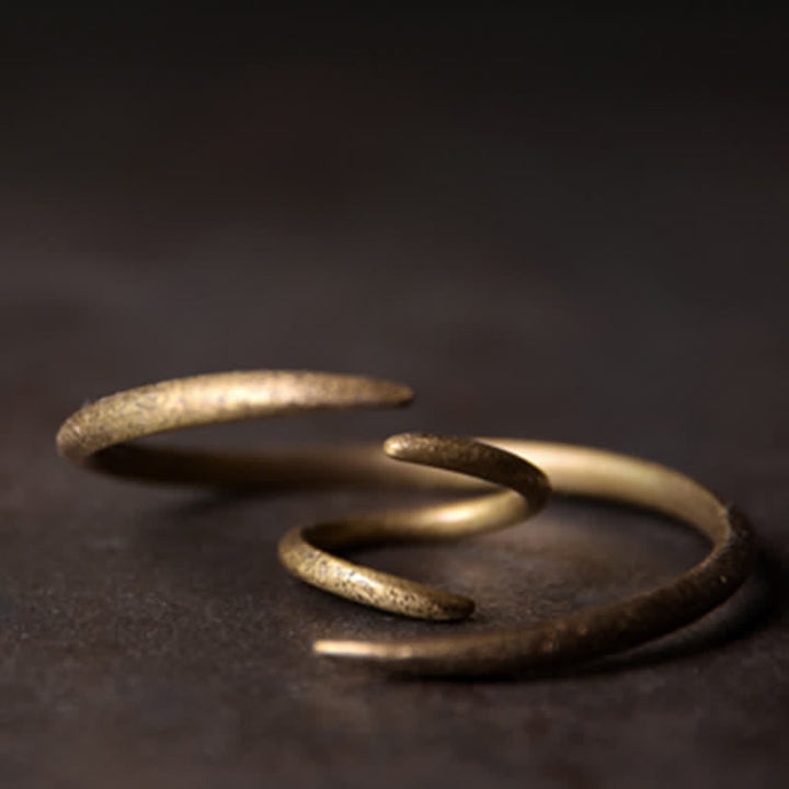 Kupfer Armband Glück Segen spiralförmig golden glänzend elegant minimalistisch