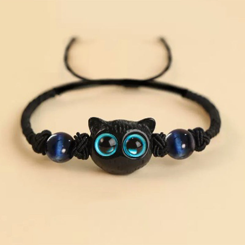 Armband Ebenholz Katze mit blauen Augen Energiestein elegant.