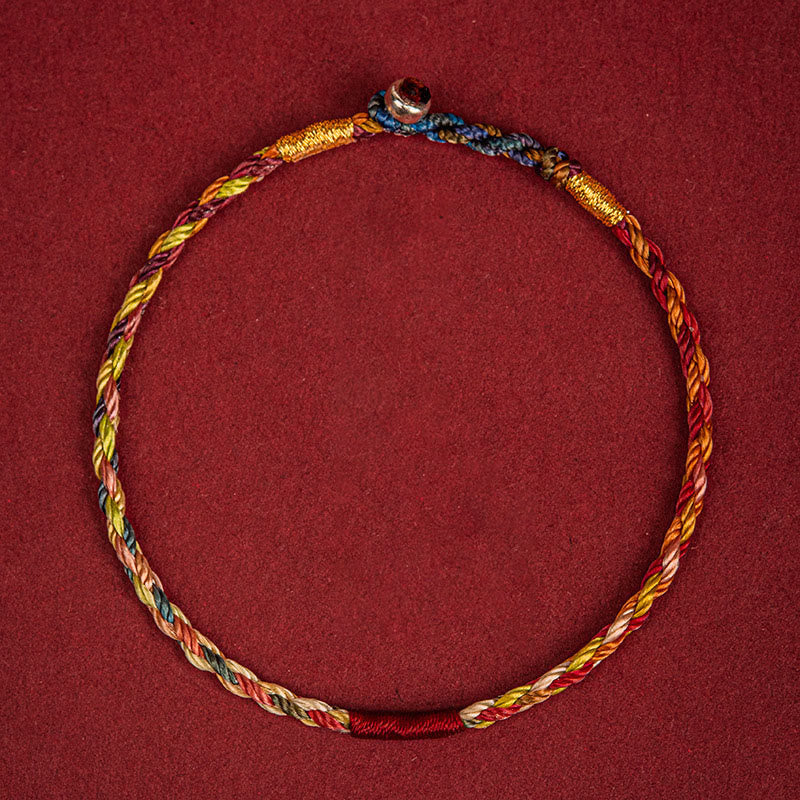 Armband Fünffarben Geflochten Schutz Glück geflochtenes buntes Textilarmband Flat Lay