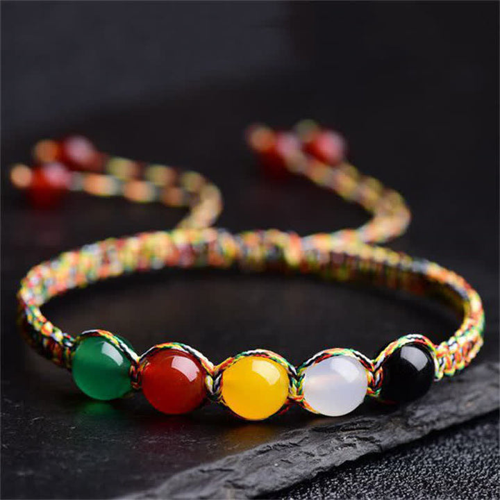Armband Achat Fünf Elemente bunte Steine schwarzer Hintergrund elastisch