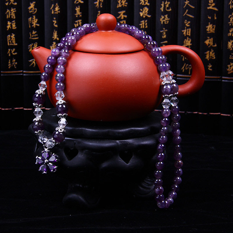 Armband Amethyst – Segen mit lila Steinen und Kristallperlen elegant.