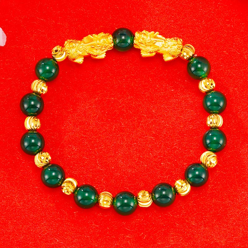 Armband Pixiu – Wohlstand mit grünen Steinen und goldenen Perlen elastisch.