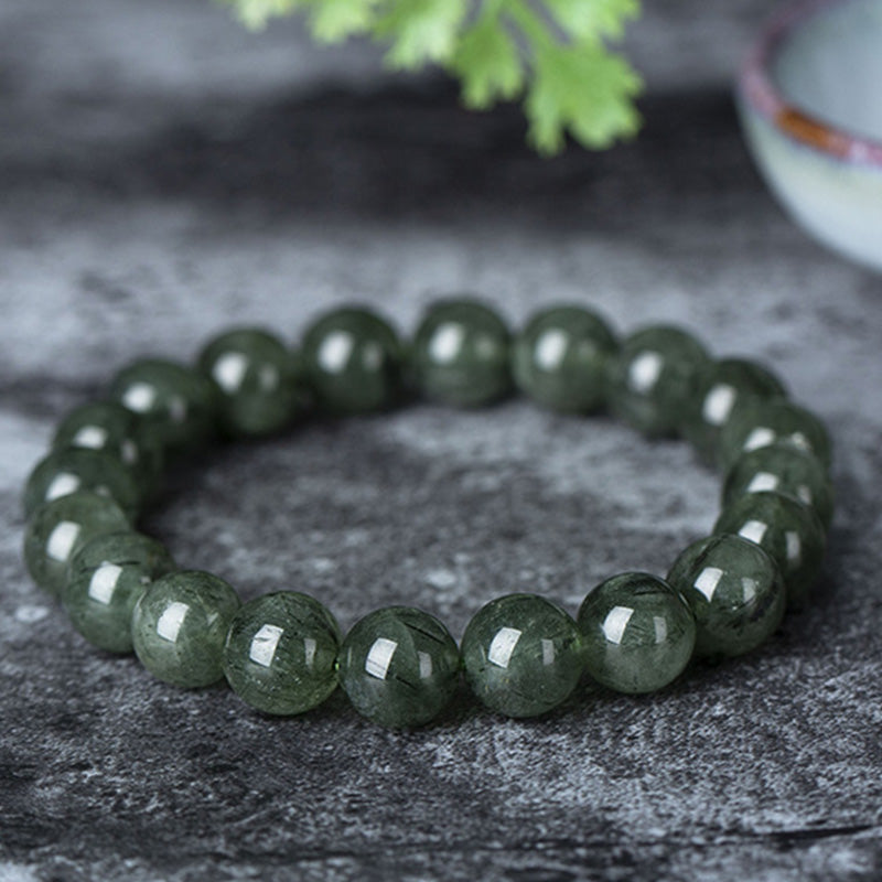 Grünes Kristall Armband Wohlstand & Segen Naturstein Perlen Flachaufnahme