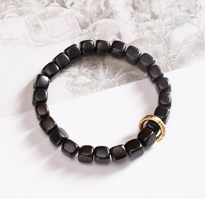 Armband Ebenholz – Balance & Ruhe schwarze Perlen Goldverschluss elegant
