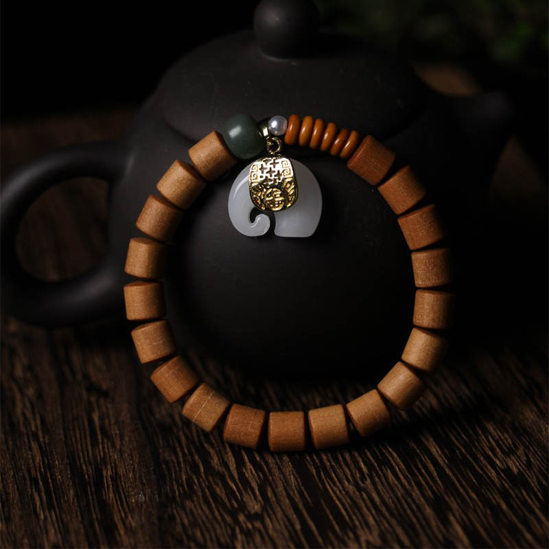 Armband Sandelholz Jade Elefant Schutz grüne Perlen elegant