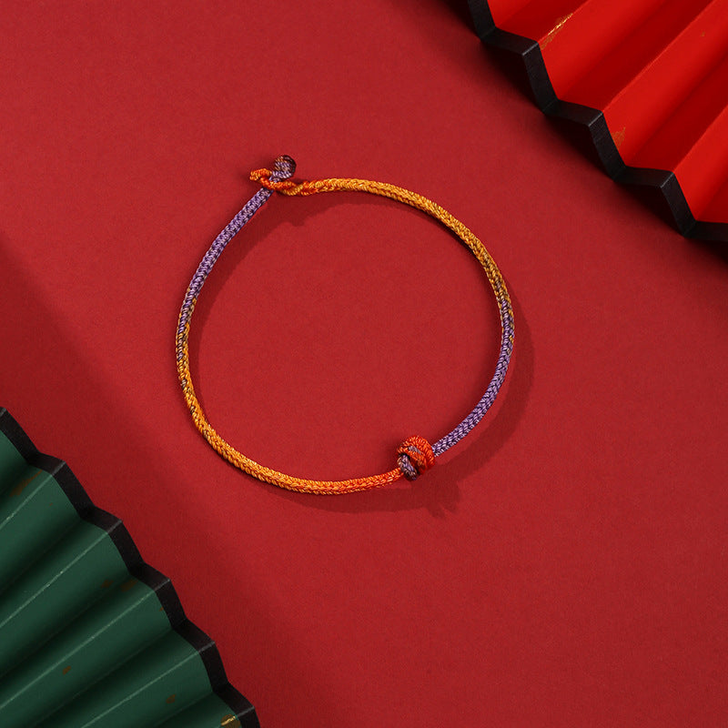 Buntes Armband Lila Gold Rot elastisch geknüpft Schmuck