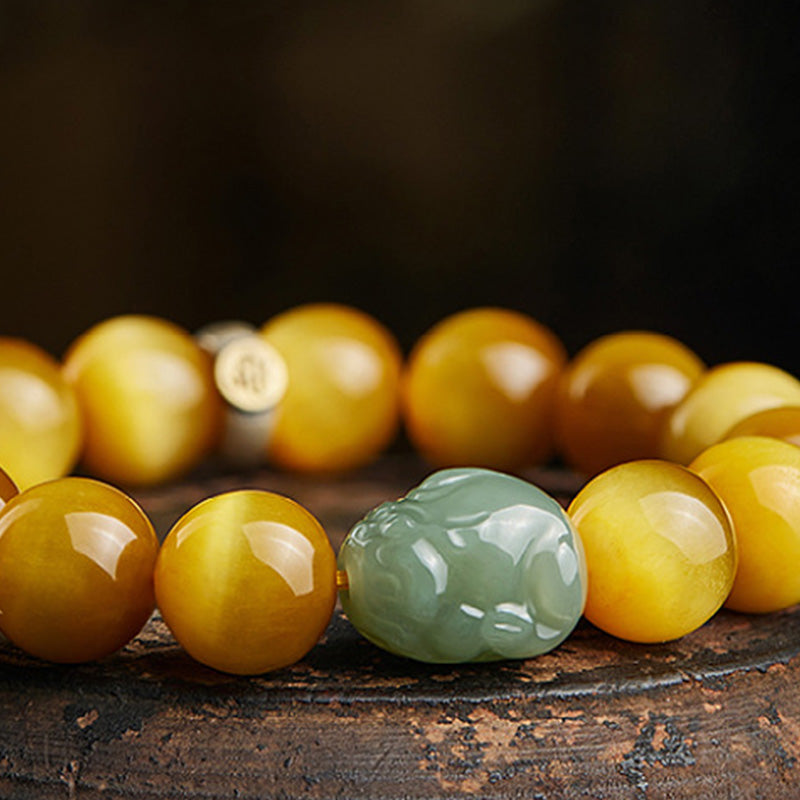 Armband Tigerauge Jade Chinesisches Tierkreis gelbe Perlen grüner Stein