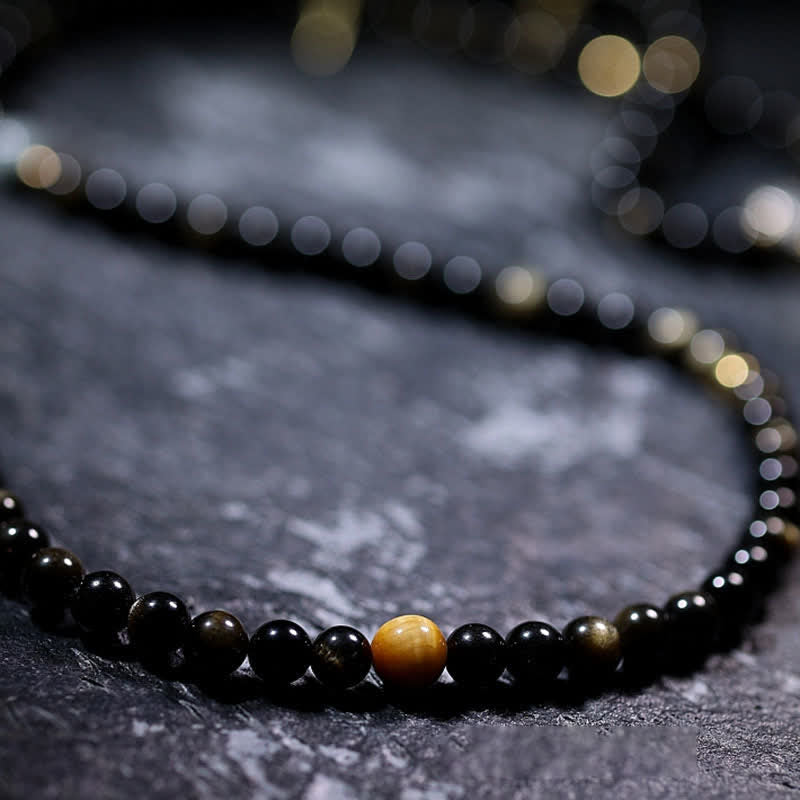 Mala Tigerauge Obsidian Armband mit goldenen Akzenten Wohlstand.