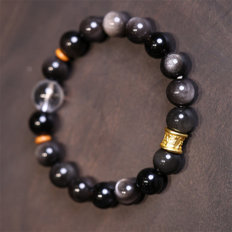 Schwarzes Obsidian Armband mit goldener Perle eleganter Naturstein Schmuck