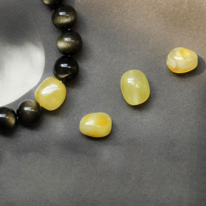 Gelbe Jade Perlen Armband mit schwarzem Obsidian Natursteinen Schmuck