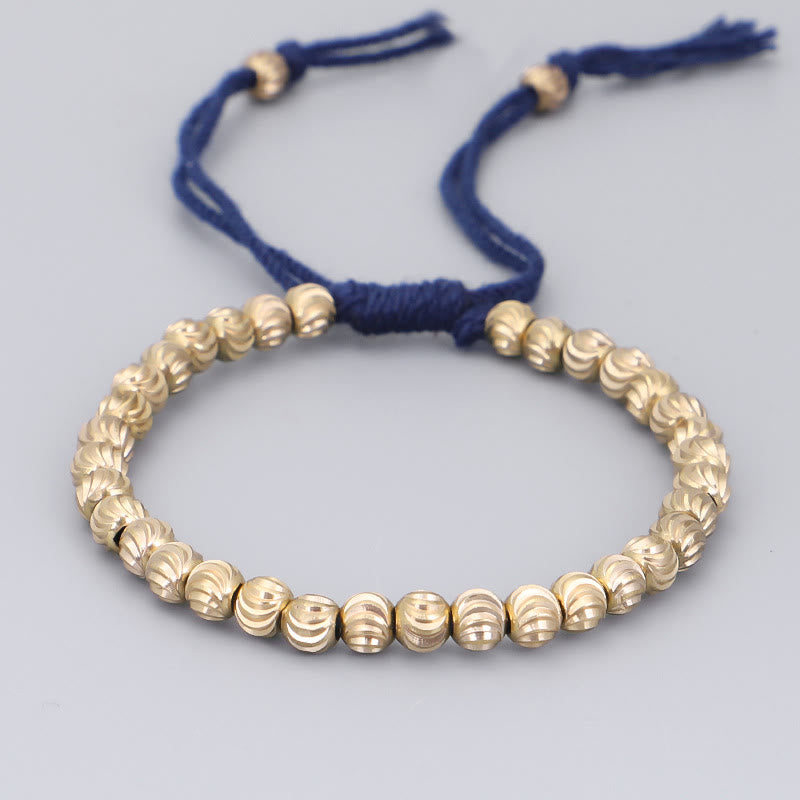 Armband Kupfer – Glück Balance mit goldenen Perlen blauem Seidenfaden