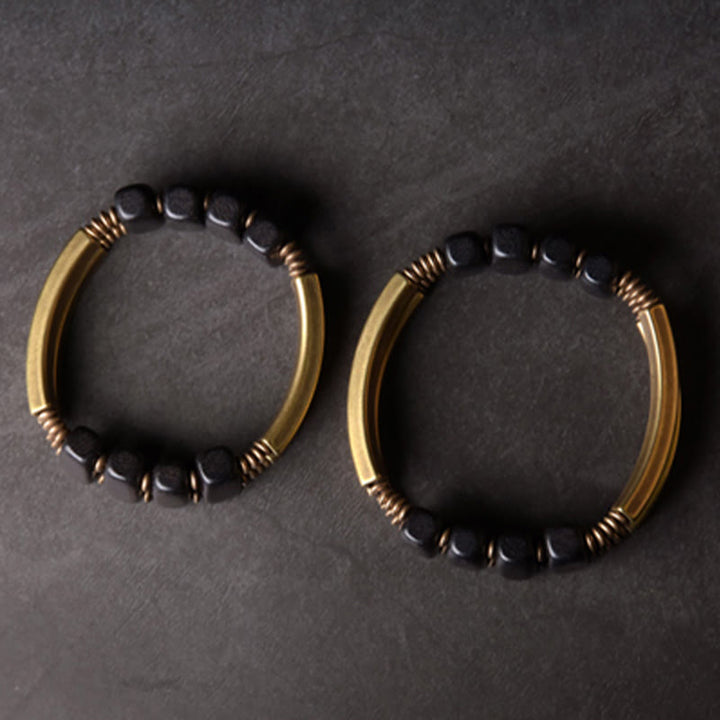 Armband Kupfer Ebenholz Balance Energie schwarze Perlen elegant glänzend