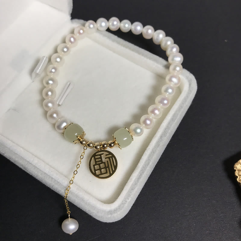 Armband Perle Jade – Glück mit goldenem Anhänger elegant.