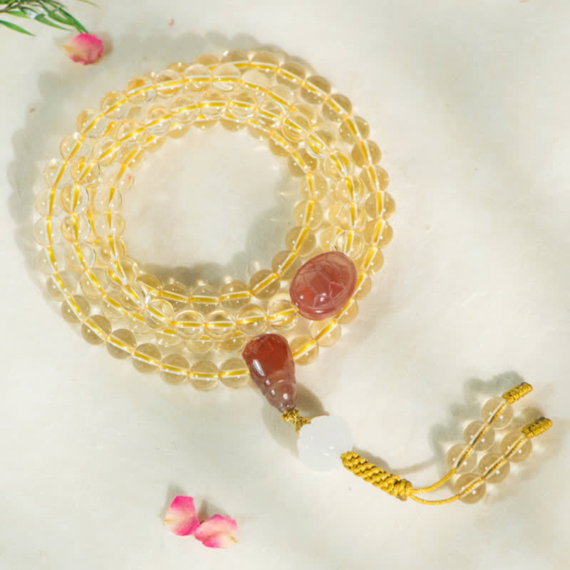 Citrin Mala Armband mit roten Achat Anhängern elegantes Design.