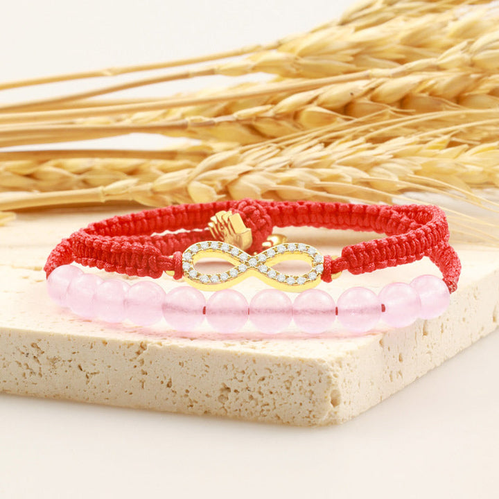 Armband Kristall Lotus rotes Makramee rosa Perlen Infinity Charm