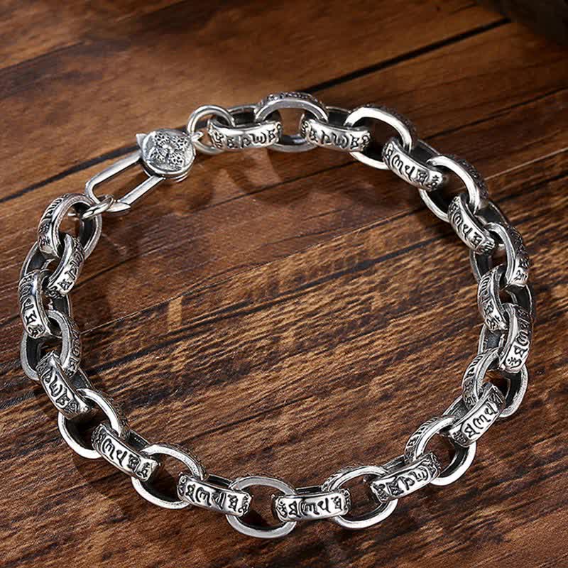 Armband 925 Silber Om Mani Padme Hum Kette auf Holz Oberfläche