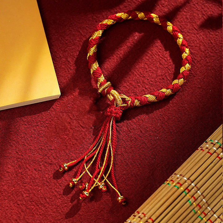 Rotes Armband Drachen – Glück & Wohlstand Energie mit goldenen Fäden.