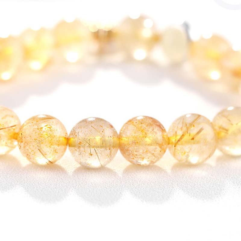 Citrin Armband mit glänzenden Perlen goldenes Licht Schutz Glück