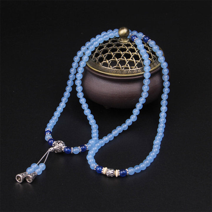 Mala 108 Perlen Kristall Blau Heilstein Halskette mit Quasten eleganz