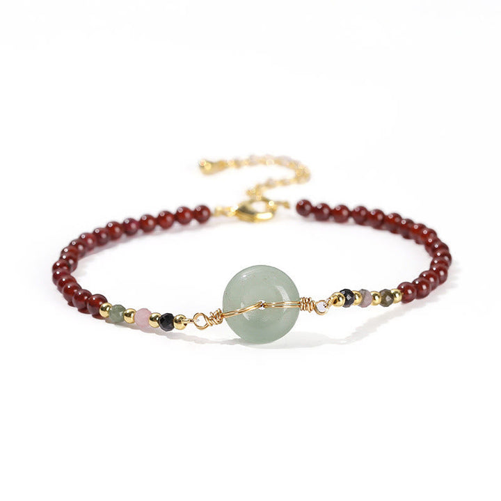 Armband Granat – Frieden & Ruhe mit grünem Jadependel elegant