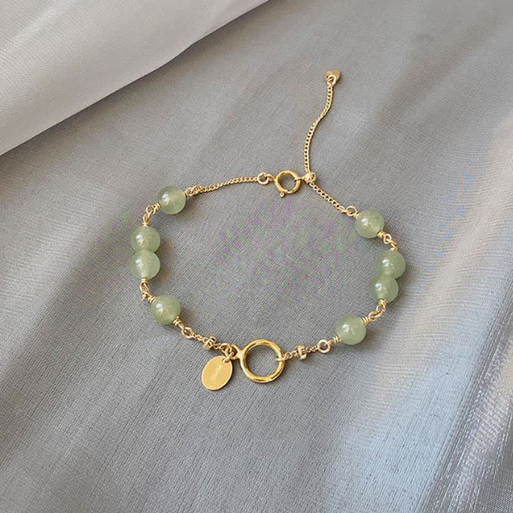 Armband Jade – Glück mit goldenen Perlen und Anhänger elegantes Design