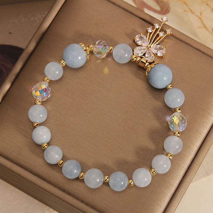 Armband Aquamarin Kristall Schmetterling Heilung goldene Perlen elegant.