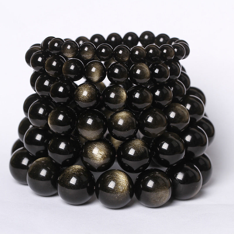 Tibetanischer Obsidian Armband schwarze glänzende Perlen Naturstein elastisch.
