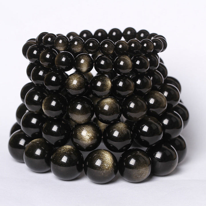 Tibetanischer Obsidian Armband schwarze glänzende Perlen Naturstein elastisch.