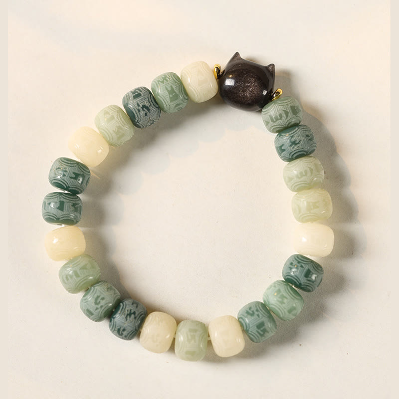 Armband mit grünem Jade, Obsidian und Bodhi-Perlen elegant arrangiert.
