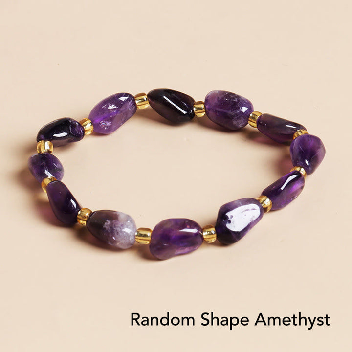 Amethyst Kristall Armband mit goldenen Perlen elastisch lila Naturstein