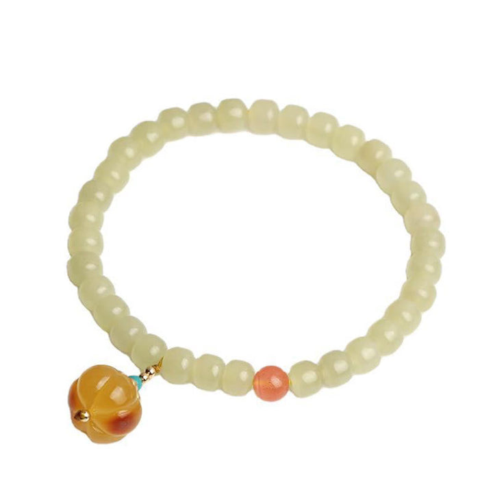 Armband Roter Achat Kristall – Wohlstand mit gelblichen Perlen elastisch