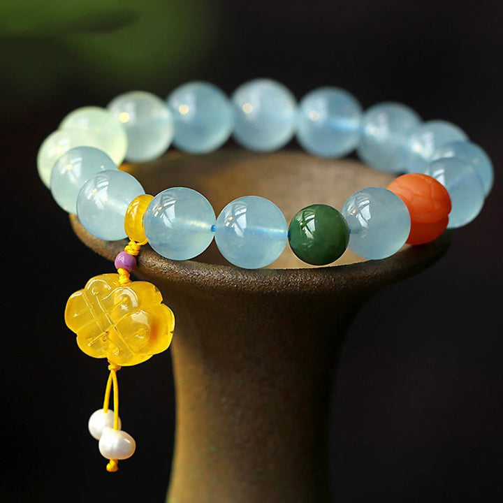 Armband Aquamarin – Frieden hellblaue Perlen Naturstein elastisch getragen