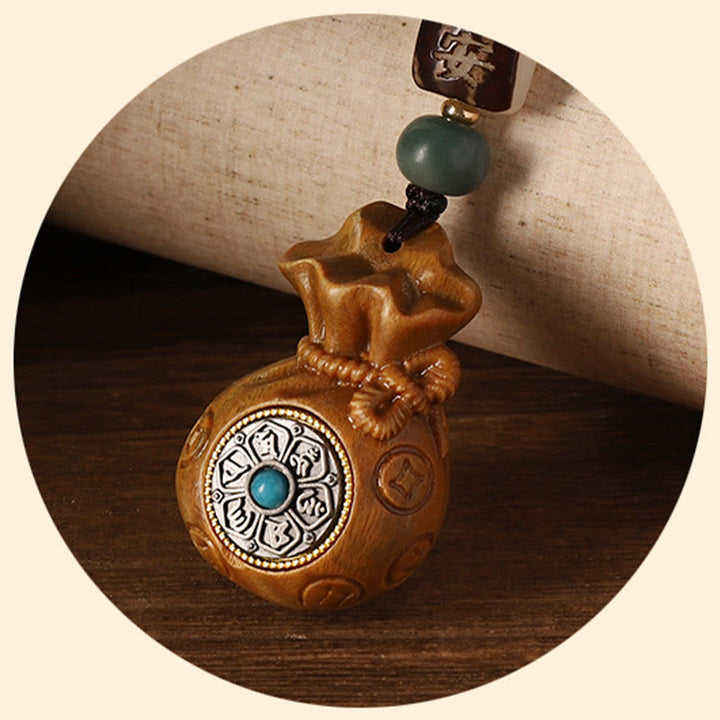 Sandelholz-Armband mit Om-Symbol und Jade-Perle elegantes Accessoire.