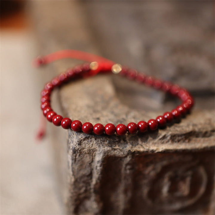 Rotes Zinnober Armband Segen Energie Naturstein elastisch getragen