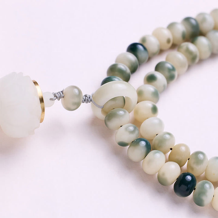 Armband Bodhi Lotus mit Perlen in Weiß und Grün eleganter Schmuck.