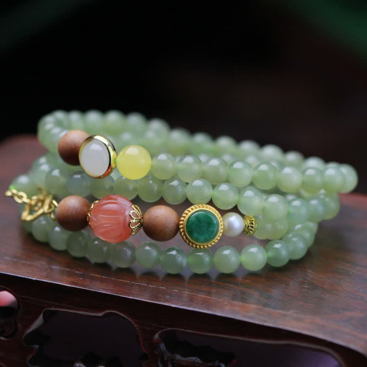 Jade Armband mit rotem Achat und Lotus Perlen elastisch